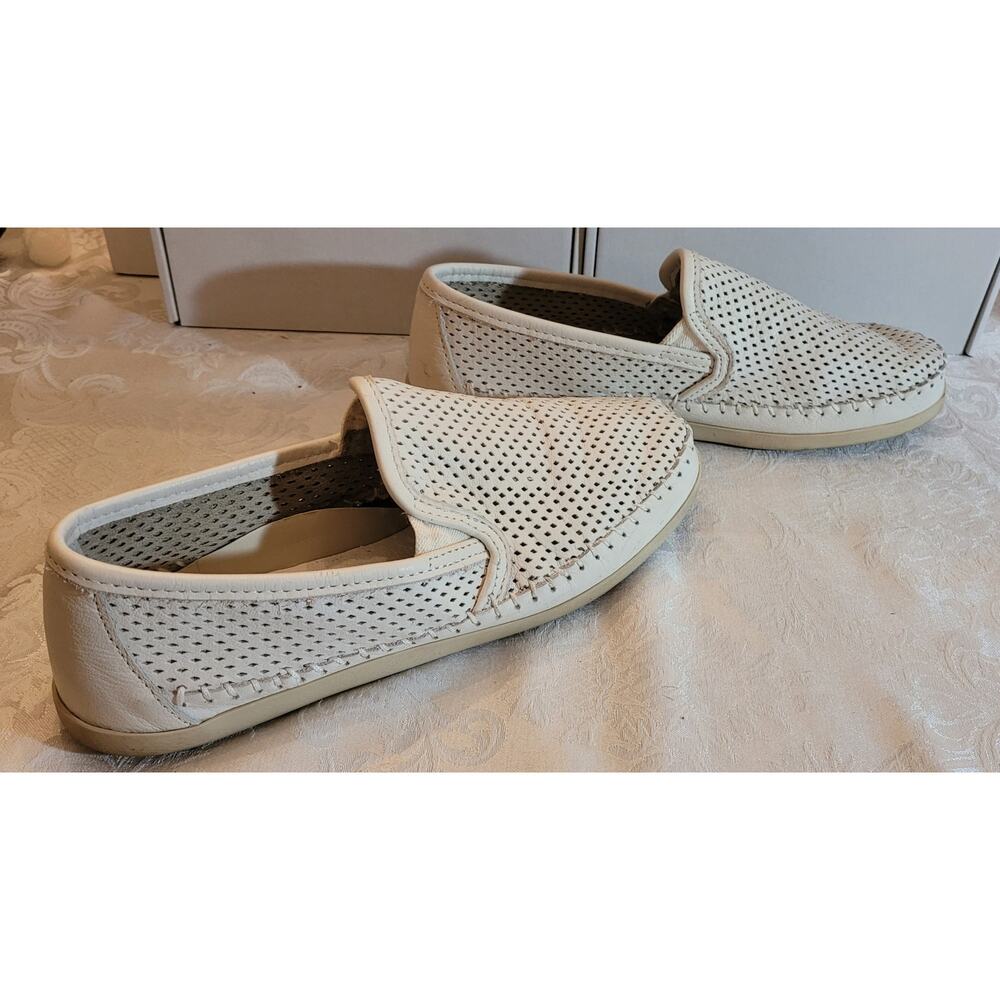 Minnetonka Perforated Slip-On Loafers in Off-White/Cream